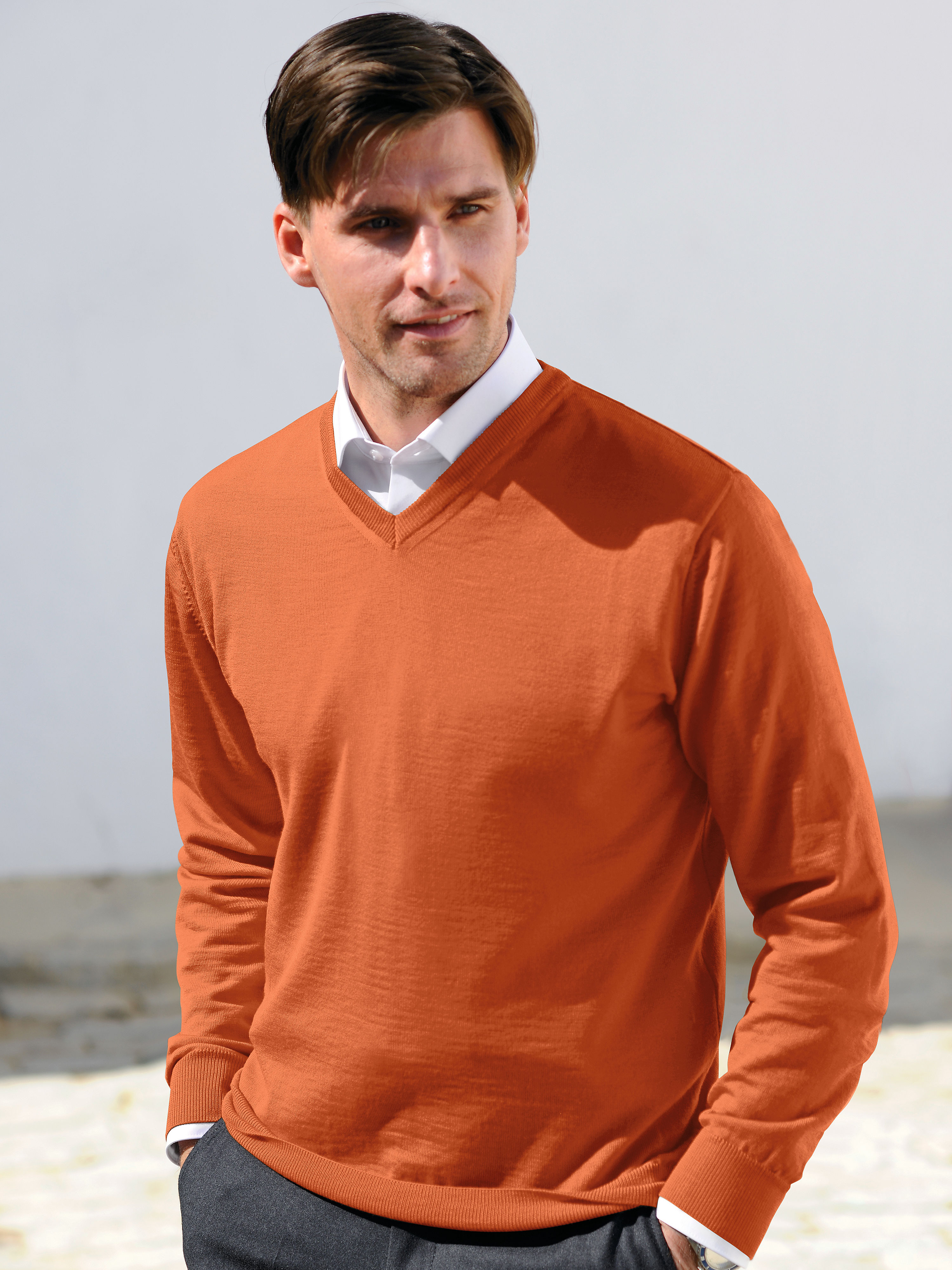 Image of V neck jumper in 100% new milled wool Peter Hahn orange