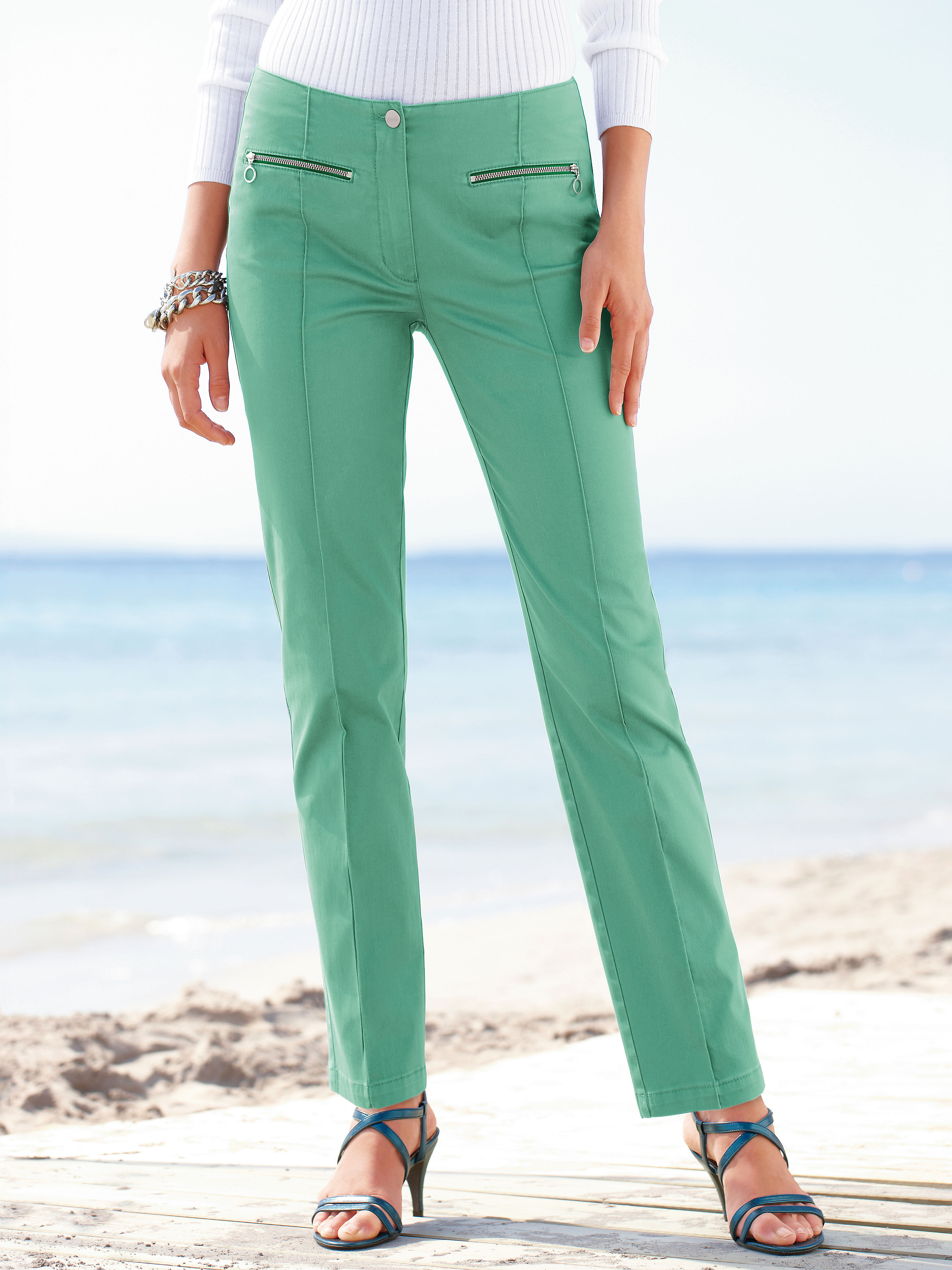 Image of Figure-flattering, narrow leg trousers Vanilia green