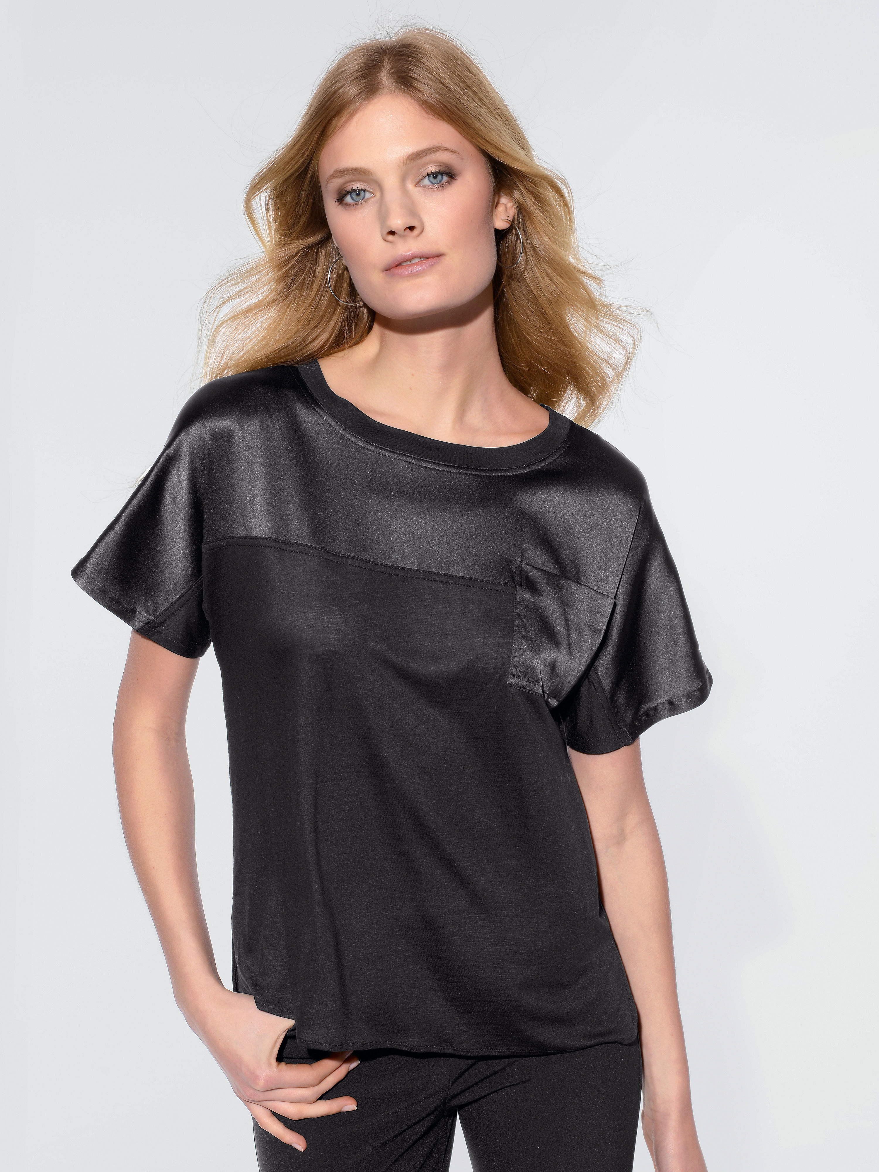 Image of Round neck top with tailored 1/2-length sleeves Strenesse black